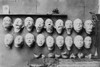 Plaster Casts Of Ww1 Soldiers' Mutilated Faces In Sculptor Anna Ladd Studio. 1918. Below Them Are Plaster Molds Of 'Restored' Faces Ladd Modeled. On The Table Are Final Masks Made To Fit Over The Disfigured Part Of The Face. France - Item # VAREVCHIS