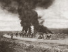 World War I: Balkan Front. /Nbritish Artillery Passing On A Road And Targeted By Enemy Air Raid Bombers, Who Instead Struck Houses In A Nearby Village, On The Balkan Front During World War I. Photograph, C1916. Poster Print by Granger Collection - It