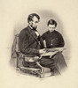 Abraham Lincoln (1809-1865)./N16Th President Of The United States. Lincoln And His Son Thomas ('Tad') Looking At A Photograph Album In Mathew Brady'S Washington, D.C., Studio. Photographed By Anthony Berger On 9 February 1864. Poster Print by Granger