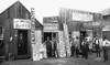 Oklahoma: Guthrie, 1889. /Nbuildings On Harrison Avenue In Guthrie, Oklahoma. Left To Right: City Marshal'S Office, Walker & Mccoy Sign Company, Douglass & Clark Lunch Room And Grocery. Photographed By Harmon T. Swearingen, 1889. Poster Print by Gran