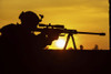 Silhouette of Army sniper with large-caliber rifle against sunset. Poster Print by Oleg Zabielin/Stocktrek Images - Item # VARPSTZAB102184M