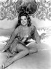 Angie Dickinson - Sitting on Bed Photo Print (8 x 10) - Item # DAP1312