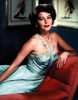 Ava Gardner - Blue Dress on Couch Photo Print (8 x 10) - Item # DAP11939