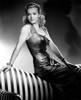 Carole Landis - sitting on edge of couch Photo Print (8 x 10) - Item # DAP14462