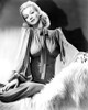 Carole Landis - sitting on white fur Photo Print (8 x 10) - Item # DAP14473
