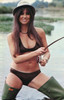 Caroline Munro - fishing Photo Print (8 x 10) - Item # DAP14655