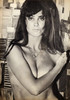Caroline Munro - topless with circle necklace Photo Print (8 x 10) - Item # DAP14693