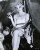 Carroll Baker - sitting in towel with drink Photo Print (8 x 10) - Item # DAP14734