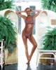 Cheyl Ladd - Posed in Orange and Blue Bikini Photo Print (8 x 10) - Item # DAP15055