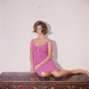 Claudia Cardinale - Pink Dress Sitting Photo Print (8 x 10) - Item # DAP15524
