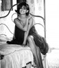 Claudia Cardinale - Sitting on Bed Photo Print (8 x 10) - Item # DAP15340