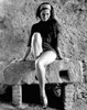 Claudia Cardinale - Stone Bench Photo Print (8 x 10) - Item # DAP15445