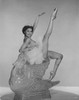 Cyd Charisse - leg up on glass swan Photo Print (8 x 10) - Item # DAP15865
