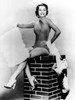 Cyd Charisse - sitting on chimney prop Photo Print (8 x 10) - Item # DAP15713
