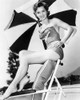 Debbie Reynolds- Sitting under an umbrella Photo Print (8 x 10) - Item # DAP16475