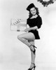 Debra Paget- One leg holding box Photo Print (8 x 10) - Item # DAP16769