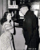Debra Paget- Talking to an older man Photo Print (8 x 10) - Item # DAP16749