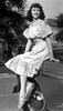 Dorothy Malone - Sitting on Car Photo Print (8 x 10) - Item # DAP17322