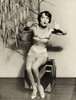 Dorothy Sebastian - Crouching Under Fake Tree Photo Print (8 x 10) - Item # DAP17486