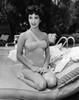 Elizabeth Taylor - Kneeling on Lounger Photo Print (8 x 10) - Item # DAP17689