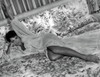 Elizabeth Taylor - Lasying on Bed with Hand Up Photo Print (10 x 8) - Item # DAP17750