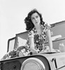 Elizabeth Taylor - Laying on Jeep Hood Photo Print (8 x 10) - Item # DAP17824