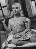 Elke Sommer - Holding Bed Frame in Floral Dress Photo Print (8 x 10) - Item # DAP17900