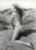 Elke Sommer - Kneeling in Sand Wearing Polka Dot Bikini Photo Print (8 x 10) - Item # DAP18145