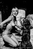 Elke Sommer - Kneeling Near Lion Statue Photo Print (8 x 10) - Item # DAP17851