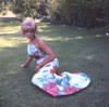 Elke Sommer - Laying in Floral Dress Photo Print (8 x 10) - Item # DAP17933