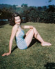 Gene Tierney - Blue Mini Dress/ Sitting on Grass Photo Print (8 x 10) - Item # DAP18174