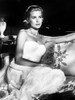 Grace Kelly - Sitting with Legs Up on Couch Photo Print (8 x 10) - Item # DAP18228