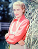 Grace Kelly - Wearing Pink Shirt and Overall Photo Print (8 x 10) - Item # DAP18239
