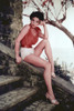 Joan Collins - Sitting on Stone Steps Photo Print (8 x 10) - Item # DAP18676