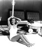 Joan Crawford - Sitting Holding Post Photo Print (8 x 10) - Item # DAP18711