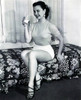 Mitzi Gaynor - Drinking on Bed Photo Print (8 x 10) - Item # DAP19222
