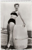 Mitzi Gaynor - Leaning on Barrel Photo Print (8 x 10) - Item # DAP19129