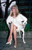 Morgan Fairchild - White Dress on White Chair Photo Print (8 x 10) - Item # DAP19410