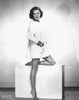 Nancy Gates - Knee Up on Prop Photo Print (8 x 10) - Item # DAP19513