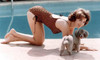 Natalie Wood - Crouching with Dog Poolside Photo Print (10 x 8) - Item # DAP110068