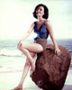 Natalie Wood - Sitting on Boulder Photo Print (8 x 10) - Item # DAP110021