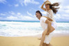 Couple On The Beach; Kealia, Kauai, Hawaii, United States Of America Poster Print by Kicka Witte / Design Pics - Item # VARDPI12267188