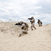 U.S. Marines run through the desert through the military operation. Poster Print by Oleg Zabielin/Stocktrek Images (12 x - Item # VARPSTZAB100117M