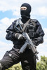 Spec ops soldier in black uniform and face mask with his rifle. Poster Print by Oleg Zabielin/Stocktrek Images - Item # VARPSTZAB100328M