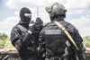Two spec ops soldiers in black uniform in action. Poster Print by Oleg Zabielin/Stocktrek Images - Item # VARPSTZAB100329M