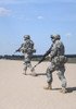 Pair of United States airborne infantry men patrolling the desert. Poster Print by Oleg Zabielin/Stocktrek Images (11 x - Item # VARPSTZAB100712M Pair of United States airborne infantry men patrolling the desert. Poster Print by Oleg Zabielin/Stocktrek Images (11 x - Item # VARPSTZAB100712M