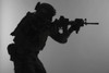 Silhouette of a U.S. Marine Corps Marsoc raider aiming gun, gray background. Poster Print by Oleg Zabielin/Stocktrek Ima - Item # VARPSTZAB102120M