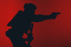Silhouette of a U.S. Marine Corps Marsoc raider aiming pistol, red background. Poster Print by Oleg Zabielin/Stocktrek I - Item # VARPSTZAB102136M