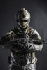 Dark contrast studio shot of Army soldier holding assault rifle. Poster Print by Oleg Zabielin/Stocktrek Images (11 x 17 - Item # VARPSTZAB102668M