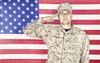 Portrait of U.S. soldier in camouflage uniform saluting American flag. Poster Print by Oleg Zabielin/Stocktrek Images (1 - Item # VARPSTZAB103426M